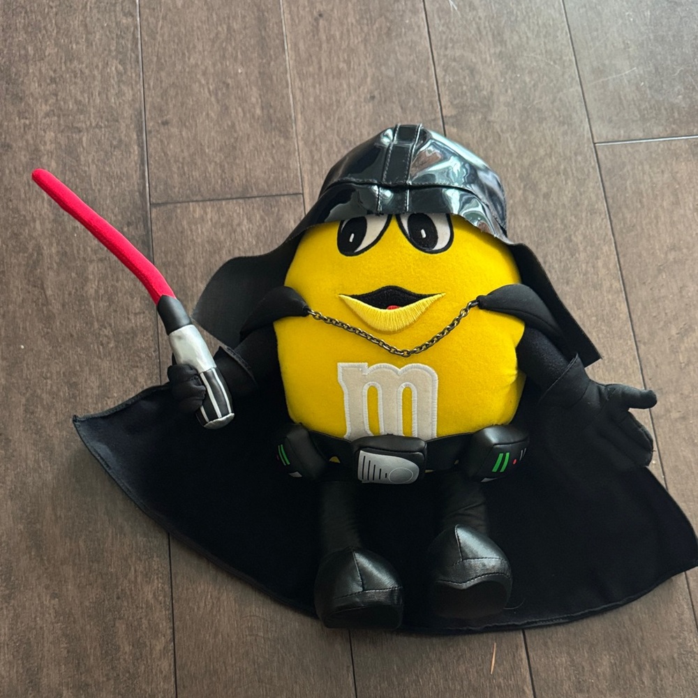 M&M'S Yellow Stuffed Toy with Black Cape and Red Saber